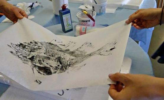 photo of fish printing on paper